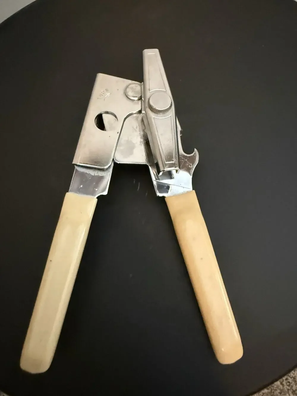 Swing Away Can Opener Ivory Rubber Grips Stainless Steel Made In USA Very Clean